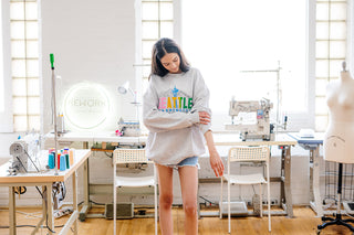 model wearing vintage Seattle sweatshirt